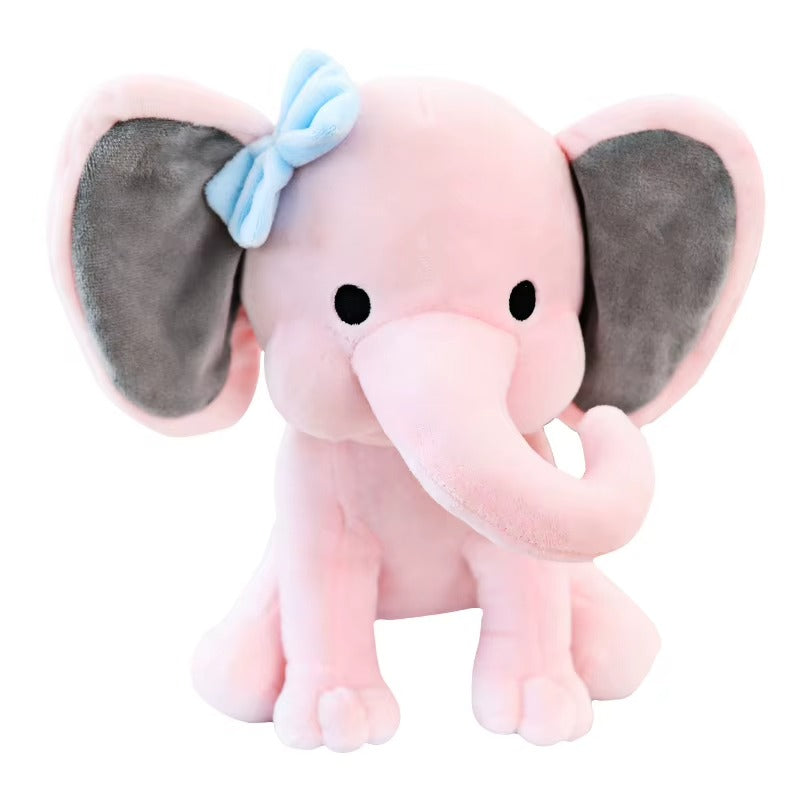 Kawaii baby elephant plush stuffed toy 25cm with pink soft body, large grey ears, blue bow and cute black eyes on white background