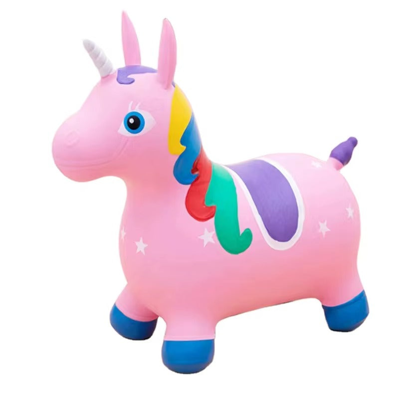 Pink inflatable jumping unicorn hopper ride-on toy for kids with rainbow mane and blue hooves on white background